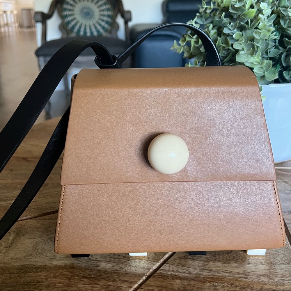 MATTER MATTERS GALLERY
MINI TRAPEZOID SHOULD BAG - BROWN Leather Crossbody Bag - Picture 4 of 16